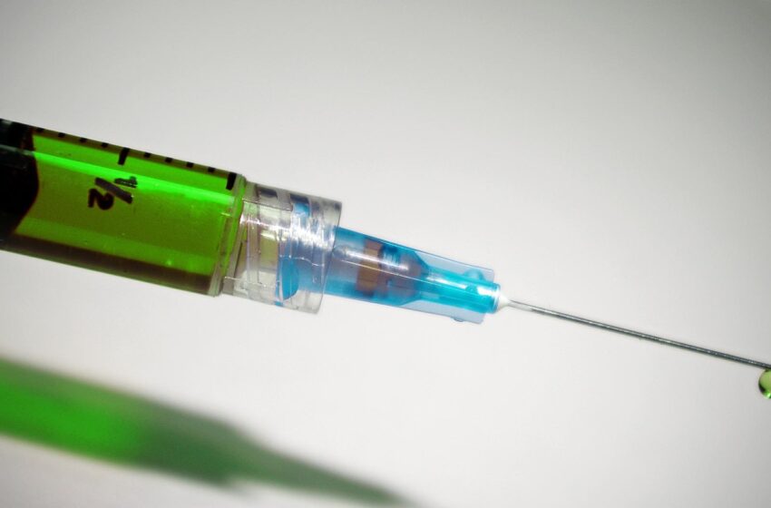 syringe with green liquid