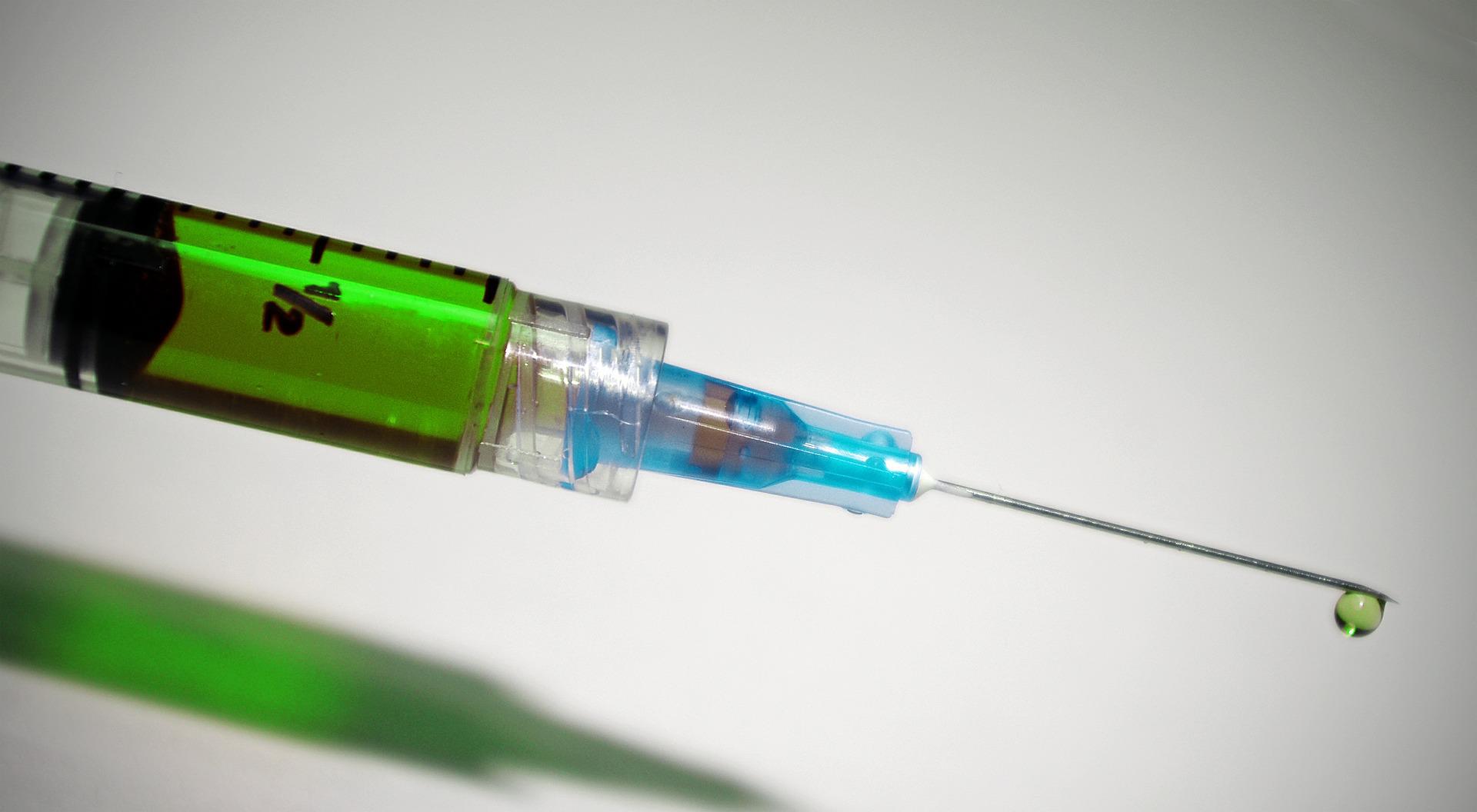 syringe with green liquid